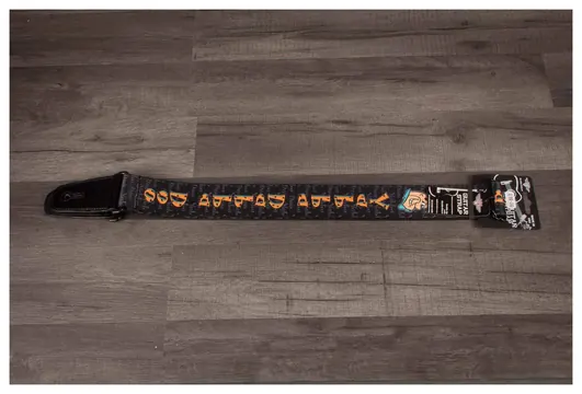 Buckle Down The Flintstones Guitar Strap